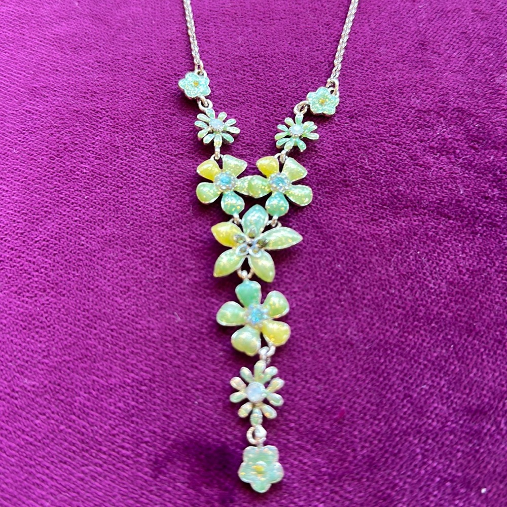 20 inch long with yellow green delicate flowers